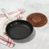 Le Creuset Toughened Nonstick PRO Fry Pan And Magnetic Wooden Trivet Set -Le Creuset Store US00129000001002 set gallery2